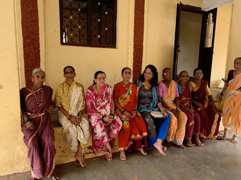 Rekha Singh with elders during a community session